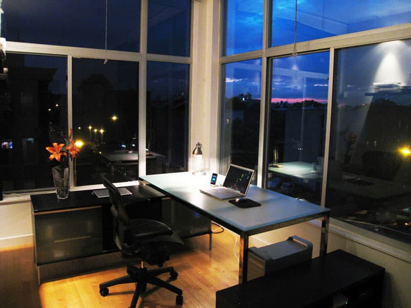 Compact home-office desk and chair. Amenity reference, not an OPod.